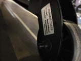  Close-up of the manufacturing sticker on an AssaultFitness Assault AirRunner frame showing model name, serial number, and a transport wheel