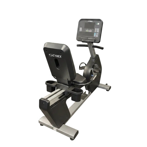 Full side profile view of a charcoal grey Cybex R-Series commercial recumbent exercise bike featuring a matte finish and step-through design.