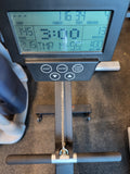 Close-up of the adjustable digital LCD workout tracking monitor and media tablet holder on an Ethos rower