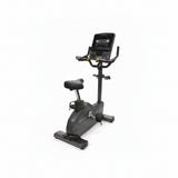 Matrix Endurance commercial upright stationary cycle bike with an ergonomic seat, multi-position handlebars, and a step-through frame design