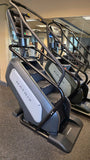 Close-up profile view of a Matrix Performance ClimbMill showcasing the step design, Control Zone safety sensor base, and side step-up platforms