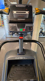 Matrix Performance commercial ClimbMill stair climber featuring a multi-window LED console showing workout level, steps climbed, and elapsed time
