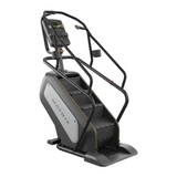 Matrix Performance commercial ClimbMill stair stepper machine featuring deep steps, ergonomic handrails, and a heavy-duty step-locking mechanism.