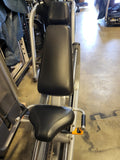 Side view showing the angled seat track and heavy-duty steel frame of the Precor Discovery Selectorized Leg Press.
